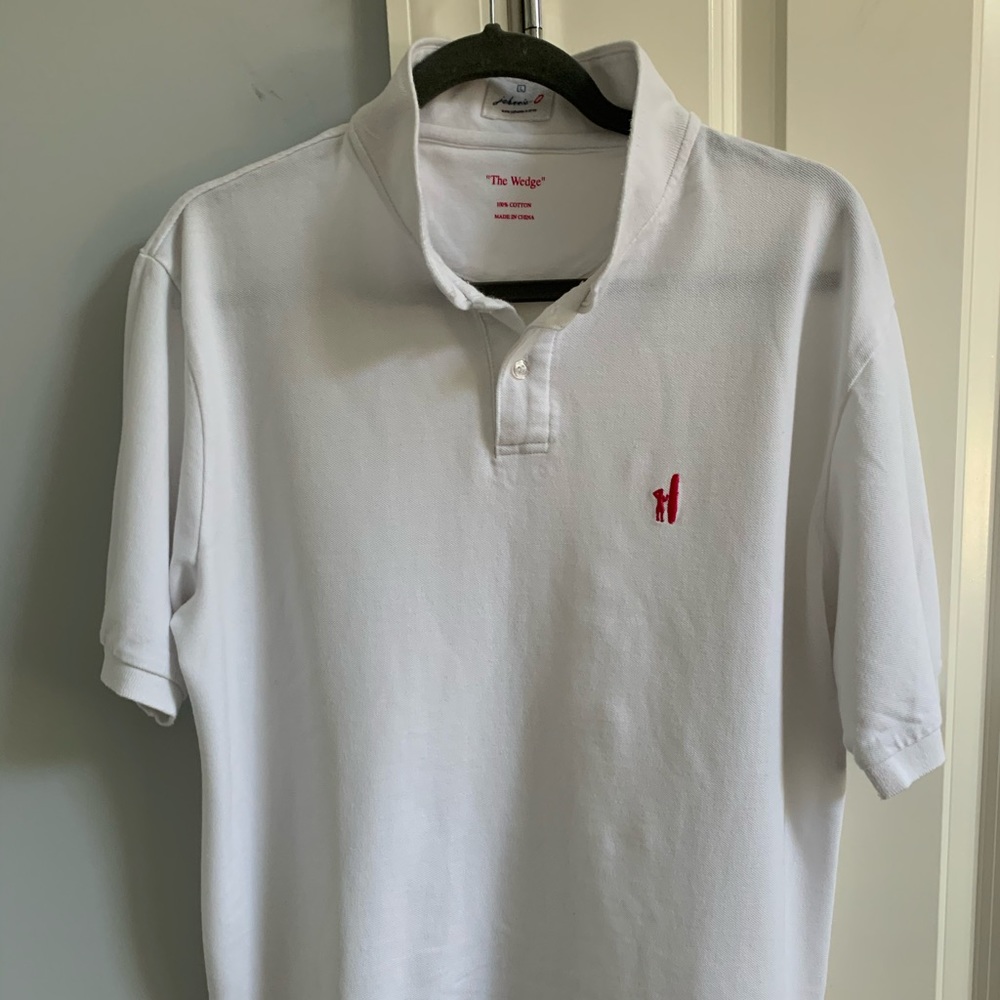 White polo shirt. Preppy look.